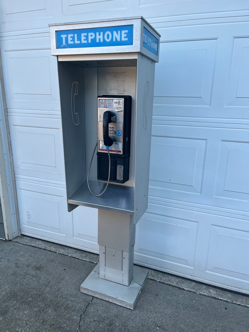 old fashioned public telephone booth